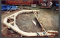 The new cruck frame being created on the ground