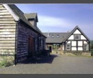 Looking past the north side of The Hafod towards the Main House showing the east gable