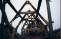 A view of the cruck frames in the Hall House after the roof has been taken off